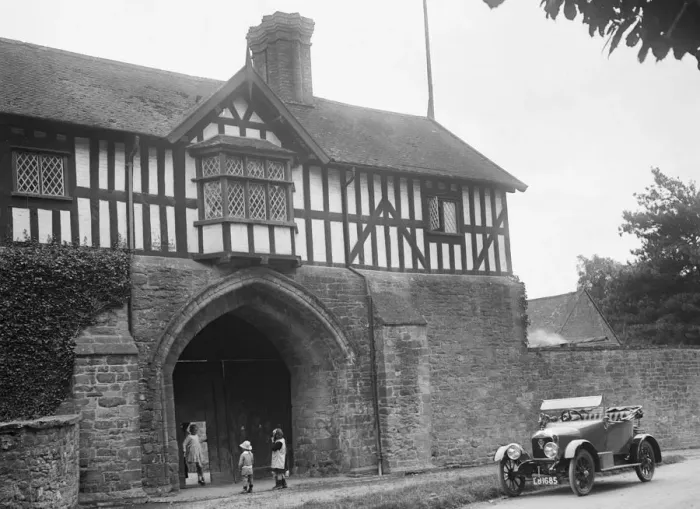 Framed Print : Singer 10 hp open 2-seater by the gatehouse of Stokesay Castle, Shropshire, 1920s Framed Print : Singer 10 hp open 2-seater by the gatehouse of Stokesay Castle, Shropshire, 1920s