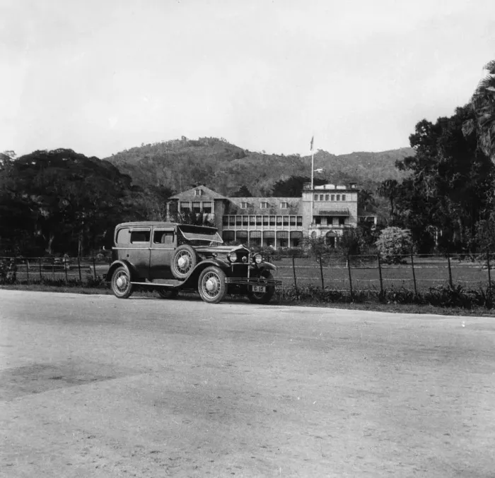 Framed Print : A Singer car in front of the Governors house, Trinidad, Trinidad and Tobago, 1931 Framed Print : A Singer car in front of the Governors house, Trinidad, Trinidad and Tobago, 1931