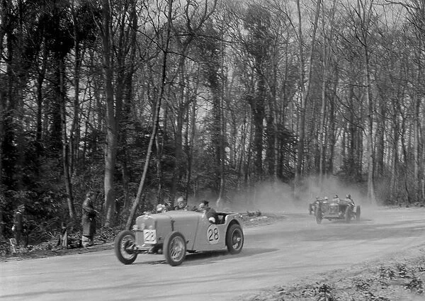 Singer of JR Baker leading a Riley at Coppice Corner, Donington Park, Leicestershire, 1933