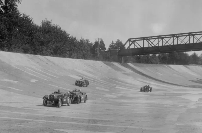 Framed Print : Singers of TW Fassett and Alf Langley and an MG racing at a MCC meeting, Brooklands, Surrey, 1933 Framed Print : Singers of TW Fassett and Alf Langley and an MG racing at a MCC meeting, Brooklands, Surrey, 1933