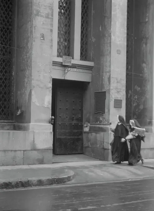 Framed Print : Sisters of Charity and the gateway of the Armory, New Orleans, between 1920 and 1926. Creator: Arnold Genthe Framed Print : Sisters of Charity and the gateway of the Armory, New Orleans, between 1920 and 1926. Creator: Arnold Genthe