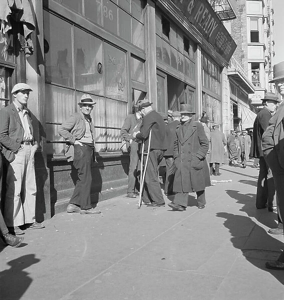 Skid Row, Howard Street, the street of the unemployed in San Francisco, California, 1937. Creator: Dorothea Lange