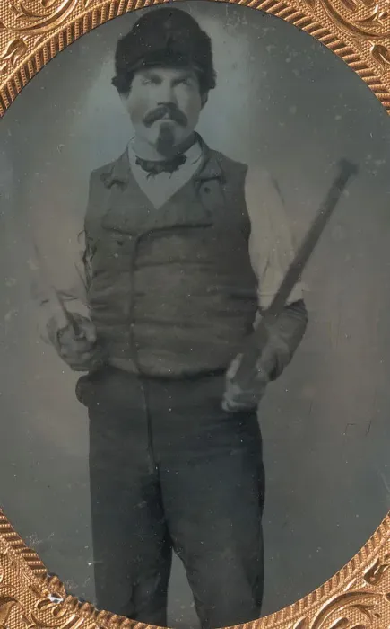 Framed Print : Slate Roofer Holding Slate Hammer and Iron Bar, 1850s-60s. Creator: Unknown Framed Print : Slate Roofer Holding Slate Hammer and Iron Bar, 1850s-60s. Creator: Unknown