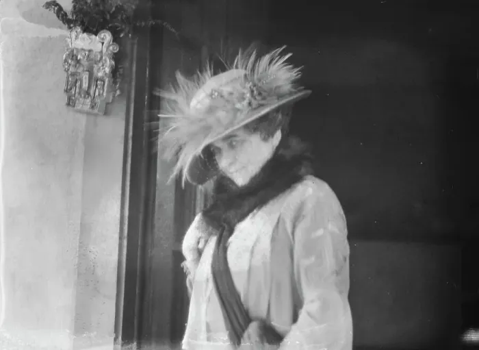 Framed Print : Slater, Mrs. standing by the door of a house in Long Beach, 1924 July. Creator: Arnold Genthe Framed Print : Slater, Mrs. standing by the door of a house in Long Beach, 1924 July. Creator: Arnold Genthe