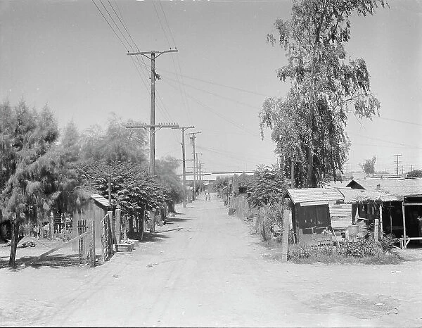 Slums of Brawley, Mexican field workers homes, Imperial Valley, California, 1936. Creator: Dorothea Lange