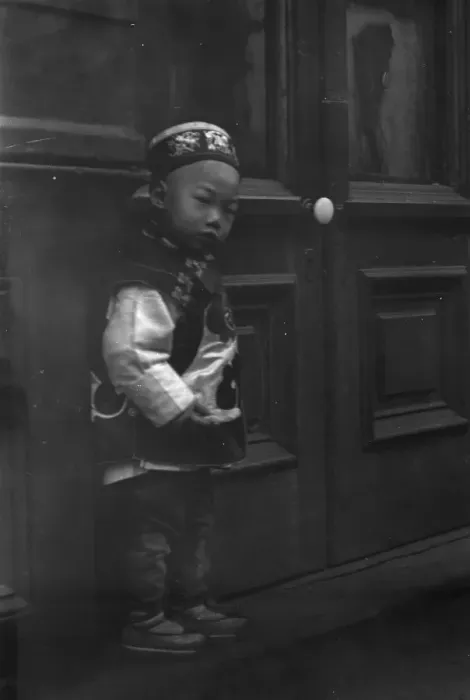 Framed Print : Small boy standing in front of a door, Chinatown, San Francisco, between 1896 and 1906. Creator: Arnold Genthe Framed Print : Small boy standing in front of a door, Chinatown, San Francisco, between 1896 and 1906. Creator: Arnold Genthe
