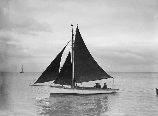 Small cutter sailing, 1912. Creator: Kirk & Sons of Cowes