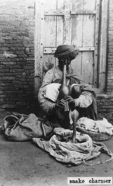 Snake charmer, India, 20th century