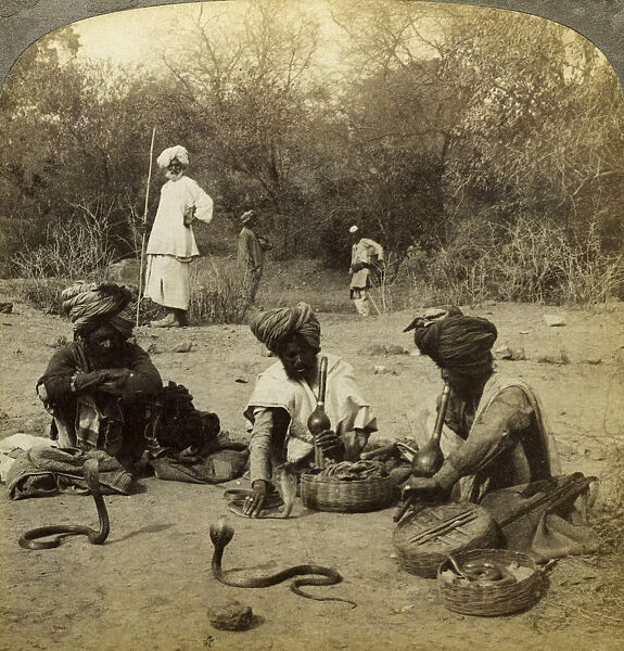 Snake charmers, Delhi, India. Artist: Underwood & Underwood