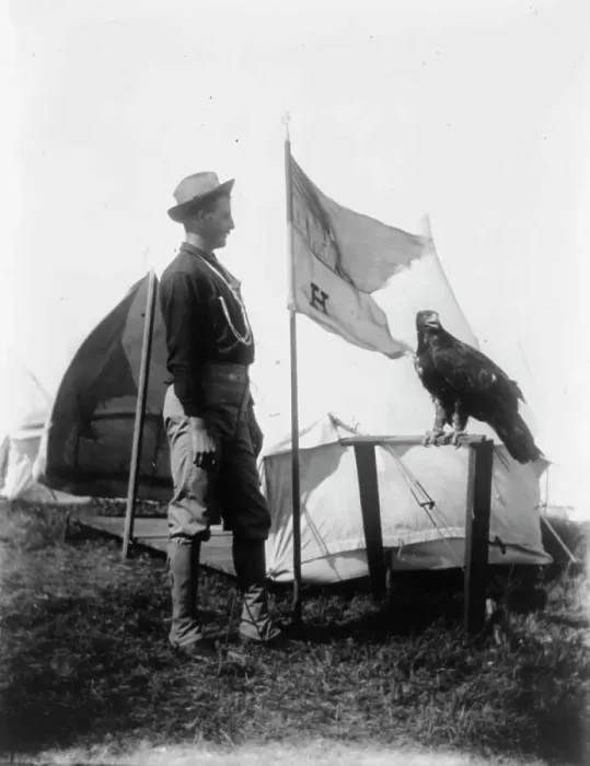 Framed Print : Soldier and eagle mascot beside H Troop flag, 1898. Creator: Frances Benjamin Johnston. Soldier and eagle mascot beside H Troop flag, 1898. Creator: Frances Benjamin Johnston Framed Print : Soldier and eagle mascot beside H Troop flag, 1898. Creator: Frances Benjamin Johnston. Soldier and eagle mascot beside H Troop flag, 1898. Creator: Frances Benjamin Johnston