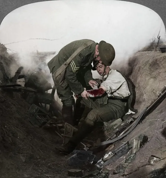 Framed Print : Soldier receiving first aid from a sergeant in a sap, Battle of Peronne, World War I, 1914-1918. Artist: Realistic Travels Publishers Framed Print : Soldier receiving first aid from a sergeant in a sap, Battle of Peronne, World War I, 1914-1918. Artist: Realistic Travels Publishers