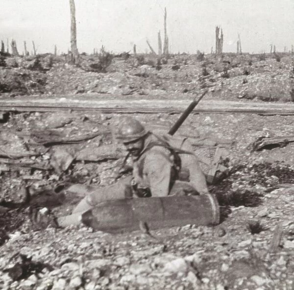 Soldier with shell, Bois d Avocourt, Verdun, northern France, c1914-c1918