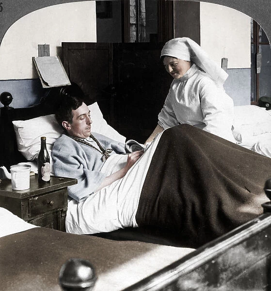 A soldier writing a letter in hospital, World War I, 1914-1918. Artist: Realistic Travels Publishers