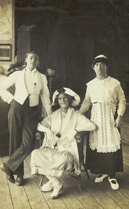 Framed Print : Three soldiers, two in drag, pose in costume, c1920. Creator: Unknown Framed Print : Three soldiers, two in drag, pose in costume, c1920. Creator: Unknown