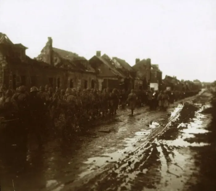 Framed Print : Soldiers marching past bombed-out houses, Champagne, northern France, c1914-c1918 Framed Print : Soldiers marching past bombed-out houses, Champagne, northern France, c1914-c1918