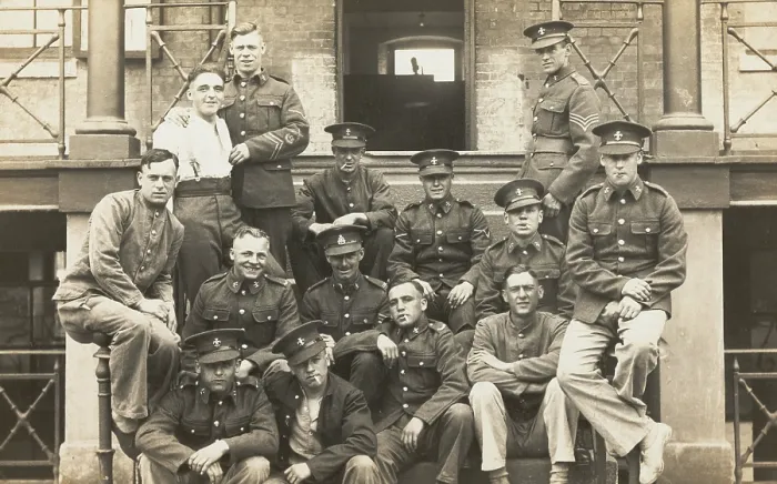 Framed Print : Soldiers posing for a group portrait outside a large building, c1910s. Creator: Unknown Framed Print : Soldiers posing for a group portrait outside a large building, c1910s. Creator: Unknown