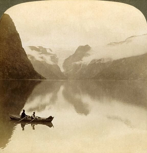 On sombre Lake Olden, between cloud-covered mountains, to Maelkevold glacier, Norway, 1905