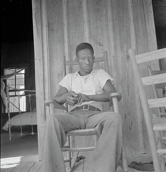 Son of an illiterate sharecropper, near Earle, Arkansas, 1936. Creator: Dorothea Lange