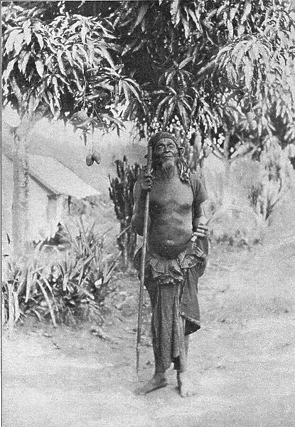 Un sorcier au Congo francais (Il porte en main l'insigne de ses fonctions... 1914. Creator: Unknown)