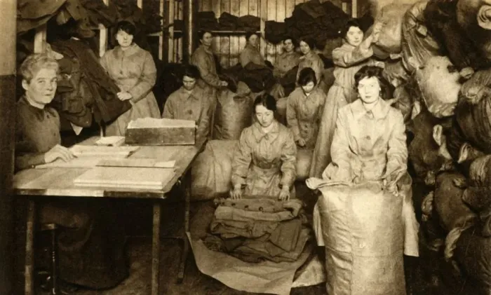 Framed Print : Sorting uniforms at the WaC clothing store, First World War, 1914-1918, (1933). Creator: Unknown Framed Print : Sorting uniforms at the WaC clothing store, First World War, 1914-1918, (1933). Creator: Unknown