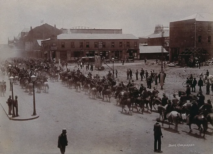 Framed Print : South Africa: Boer soldiers riding through a street in a South African town, 1896. Creator: Barnett Framed Print : South Africa: Boer soldiers riding through a street in a South African town, 1896. Creator: Barnett
