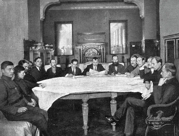 In Soviet Russia; A revolutionary tribunal made up of members of the soviet party, ... 1917. Creator: Unknown