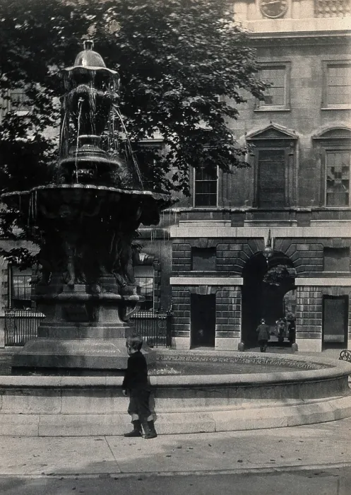 Framed Print : St Bartholomew's Hospital, London: the fountain in the centre of the courtyard with a small Framed Print : St Bartholomew's Hospital, London: the fountain in the centre of the courtyard with a small
