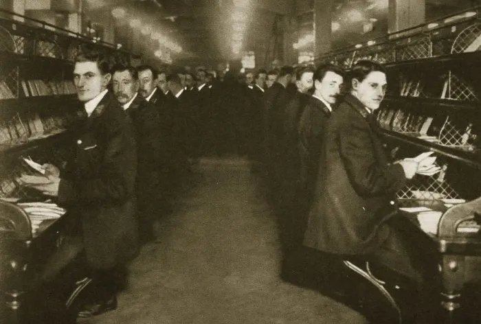 Framed Print : Staff sorting letters at the Post Office, Mount Pleasant, London, 20th century. Artist