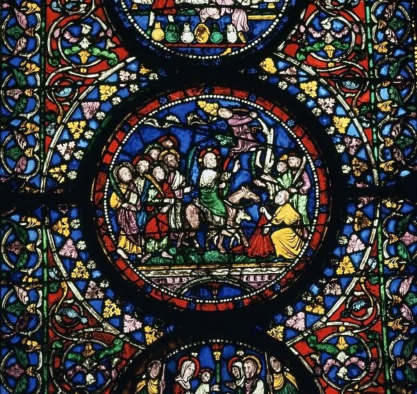 Stained glass depiction of Christs entry to Jerusalem, 12th century