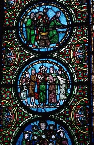 Detail of a stained glass window in St Denis, France, 12th century