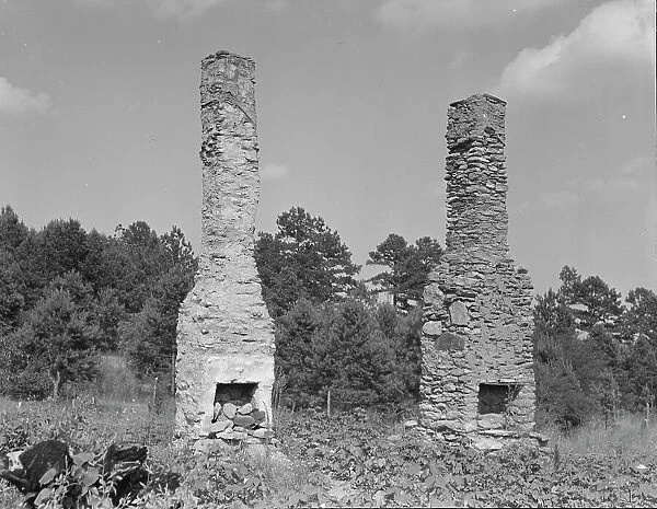 Standing chimneys of an old plantation house, Georgia, 1937. Creator: Dorothea Lange