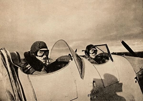 Starting on an instructional flight in a Miles Magister. The pupil is in the rear cockpit, 1940