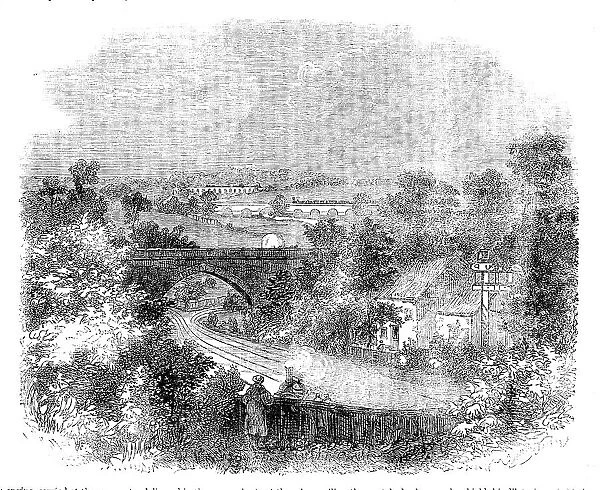 Steam locomotive approaching a bridge, 1858. Creator: Unknown