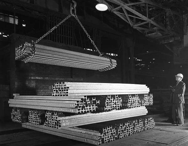 Steel H girders being stacked for distribution, Park Gate, Rotherham, South Yorkshire, 1964