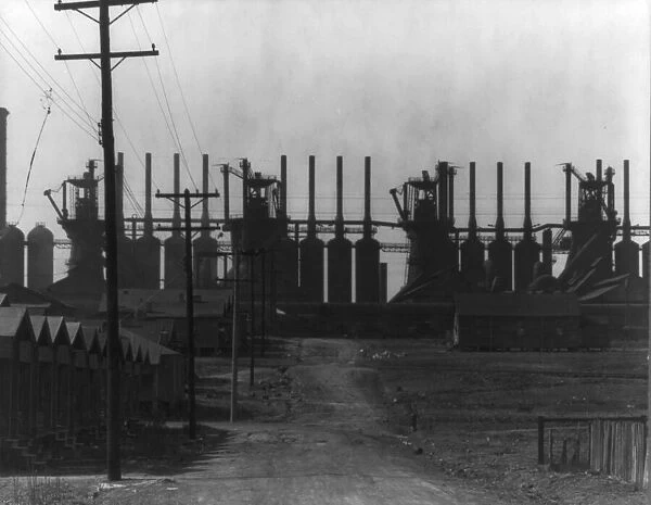 Steelmill and workers houses, Birmingham, Alabama, 1936. Creator: Walker Evans