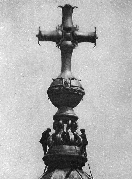 Steeplejacks on the summit of St Pauls Cathedral, London, 1926-1927
