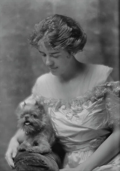 Stevens, J. Miss, with dog, portrait photograph, 1914 June 8. Creator: Arnold Genthe