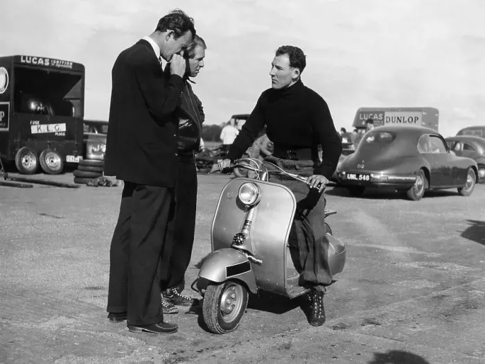 Framed Print : Stirling Moss on a Vespa scooter, Goodwood, April 1952 Framed Print : Stirling Moss on a Vespa scooter, Goodwood, April 1952