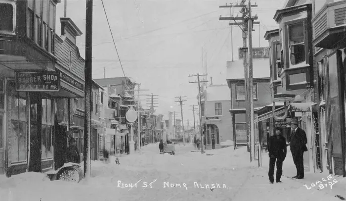 Framed Print : Front Street covered with snow, between c1900 and c1930. Creator: Lomen Brothers Framed Print : Front Street covered with snow, between c1900 and c1930. Creator: Lomen Brothers