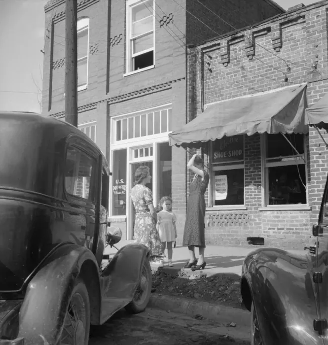 Framed Print : Street encounter on a Saturday afternoon, Pittsboro, North Carolina, 1939. Creator: Dorothea Lange Framed Print : Street encounter on a Saturday afternoon, Pittsboro, North Carolina, 1939. Creator: Dorothea Lange