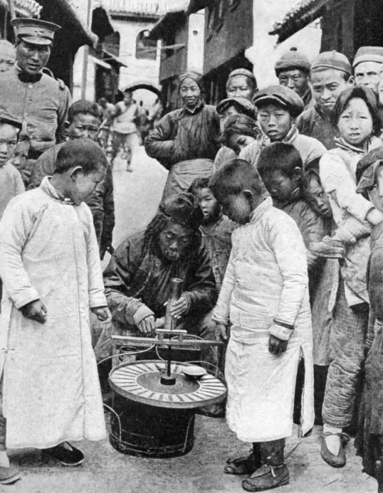 Framed Print : Street gambling, China, 1922. Artist: BT Prideaux Framed Print : Street gambling, China, 1922. Artist: BT Prideaux