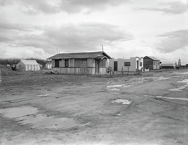 Street and homes in 'Little Oklahoma', California, 1936. Creator: Dorothea Lange. Street and homes in 'Little Oklahoma', California, 1936. Creator: Dorothea Lange