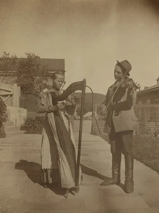 Framed Print : Street musicians with a harp and violin in the upper yard of Dom Smith, Vladivostok, Russia, (1899?) Creator: Eleanor Lord Pray Framed Print : Street musicians with a harp and violin in the upper yard of Dom Smith, Vladivostok, Russia, (1899?) Creator: Eleanor Lord Pray