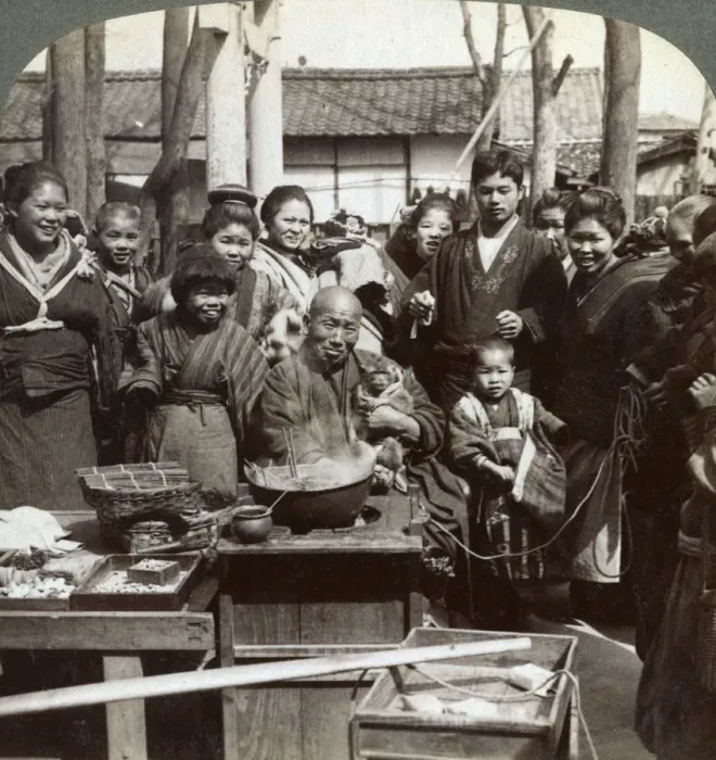 Framed Print : A street performer with a monkey amusing the crowd, Kobe, Japan, 1896. Artist: Underwood & Underwood Framed Print : A street performer with a monkey amusing the crowd, Kobe, Japan, 1896. Artist: Underwood & Underwood