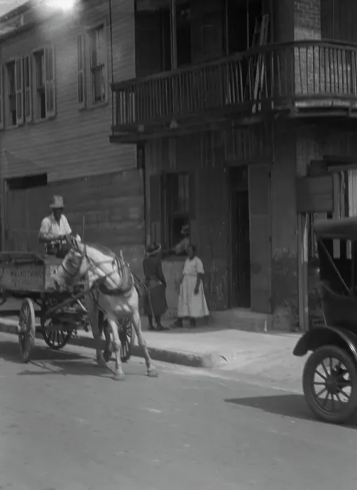 Framed Print : Street scene, including horse- or mule-drawn wagon, New Orleans, between 1920 and 1926. Creator: Arnold Genthe