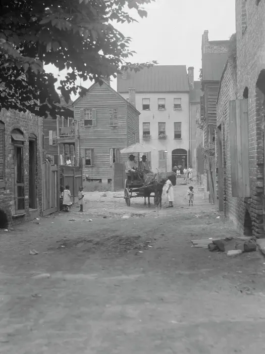 Framed Print : Street scene - looking north on Bedons Alley to Elliott Street; with horse and wagon... c1920-1926. Creator: Arnold Genthe