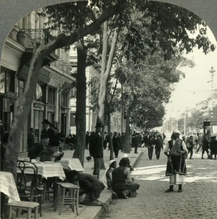 Framed Print : Street Scene Showing Peasant Woman and Sidewalk Coffee-House, Sofia, Bulgaria, c1930s Framed Print : Street Scene Showing Peasant Woman and Sidewalk Coffee-House, Sofia, Bulgaria, c1930s
