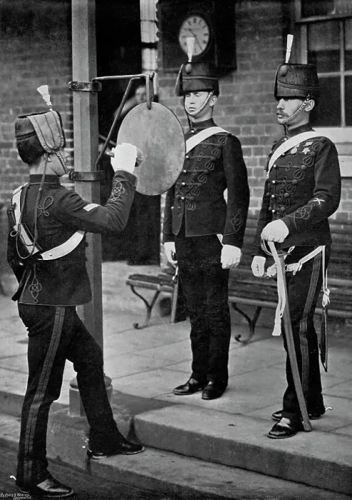 Framed Print : Striking the gong at the main gate of the Aldershot cavalry barracks, Hampshire, 1896. Artist: Gregory & Co Framed Print : Striking the gong at the main gate of the Aldershot cavalry barracks, Hampshire, 1896. Artist: Gregory & Co
