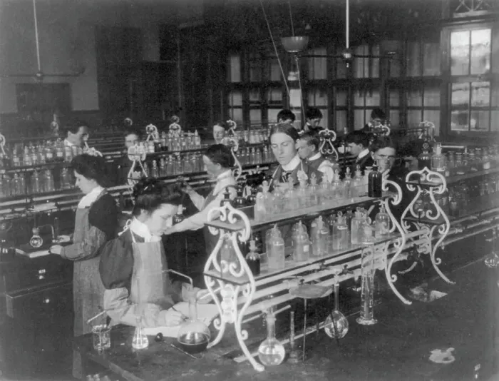 Framed Print : Students in a chemistry class conducting an experiment, Western High School, Washington DC, (1899?). Creator: Frances Benjamin Johnston Framed Print : Students in a chemistry class conducting an experiment, Western High School, Washington DC, (1899?). Creator: Frances Benjamin Johnston