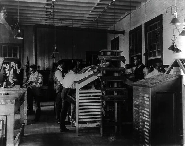 Students working in print shop, Tuskegee Institute, Alabama, 1902. Creator: Frances Benjamin Johnston